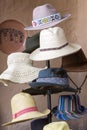 Group of colored tourist hats for sale at the market in Cusco, P