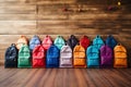 Group of colorful backpack on wooden background. Back to school concept, Colourful children schoolbags on wooden floor. Backpacks