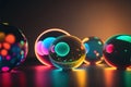 a group of colorful balls sitting on top of a table next to each other on a table top with a black background Royalty Free Stock Photo