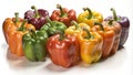 A group of colorful bell peppers arranged on a white surface Royalty Free Stock Photo