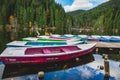 Group of colorful boats parked on a pier in Piatra Neamt, Romania