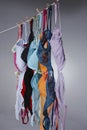 Numerous Colorful Bras Are Hung On A Close Line In A Studio Environment