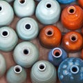 Group of colorful ceramic pots.