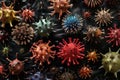 A group of colorful coronaviruses on a black background