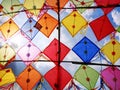 Group of Colorful Decorative Kites Against Cloudy Sky Royalty Free Stock Photo