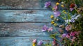 Bunch of flowers on wooden surface Royalty Free Stock Photo