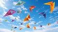 Kites flying in a blue sky