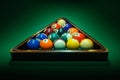 Triangle with billiard balls on green table