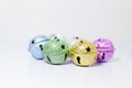 Group of Colorful painted pet small bells for cats and dogs on white background. Pet Shopping Product, Accessories, Animal Tracing Royalty Free Stock Photo