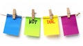 A group of colorful papers tied to a clothesline with the words hot deal, AI Royalty Free Stock Photo