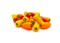Group of colorful red, yellow and orange mini sweet peppers snack isolate on white Royalty Free Stock Photo