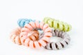 Group of colorful spiral rubber bands. Elastic hair ties in vibrant colors Royalty Free Stock Photo