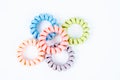 Group of colorful spiral rubber bands. Elastic hair ties in vibrant colors Royalty Free Stock Photo