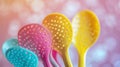 A group of colorful spoons with holes in them are lined up, AI Royalty Free Stock Photo