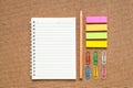 Group of colorful stationery tools on brown background