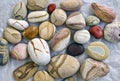 Group of colorful stones with different pattern polished by the sea