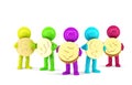 Group of coloured 3d people holding coins. Isolated. Contains clipping path