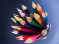 A group of coloured pencils in a glass tumbler Royalty Free Stock Photo