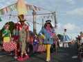 New Zealand: small town Christmas parade clowns playing