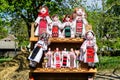 Group of colourful textile traditional hand made decorations, dolls and  toys for children, available for sale at a traditional Royalty Free Stock Photo
