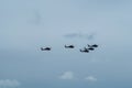 Group combat helicopters flying in blue sky Royalty Free Stock Photo