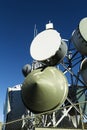 Group Of Communication Receivers Behind Fence With Blue Sky Royalty Free Stock Photo