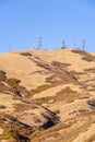 Group of communications towers on a hilltop Royalty Free Stock Photo