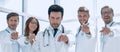 Group of confident doctors pointing their finger at you