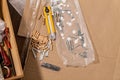 Group of connecting material cardboard screws, nails, wooden dowels, plugs. Carpentry and joinery needs. Fittings for furniture