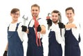 Group of construction workers with working tools Royalty Free Stock Photo