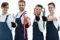 Group of construction workers with working tools Royalty Free Stock Photo