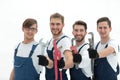 Group of construction workers with working tools Royalty Free Stock Photo
