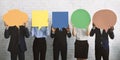 Group of corporate people hiding faces behind speech bubbles Royalty Free Stock Photo