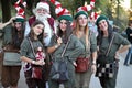 Group of Cosplayers dressed as Santa Claus and Elves at the Lucca Comics and Games 2022 cosplay event.