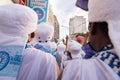 Group of costumed members of the Filhos de Gandhy carnival group during the Dois de Julho