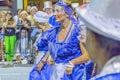 Group of costumed people marching at carnival of Uruguay