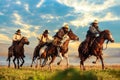 A group of cowboys riding horses.