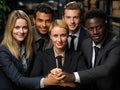 Group of coworkers huddling hands top view