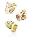 Group of crushed pistachios in the air close-up on a white background