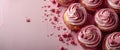 Group of Cupcakes With Pink Frosting and Sprinkles Royalty Free Stock Photo
