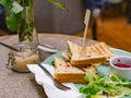 Group of Cut Toasted Sandwiches. Breakfast meal in cafe. Food concept Royalty Free Stock Photo