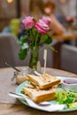 Group of Cut Toasted Sandwiches. Breakfast meal in cafe. Food concept Royalty Free Stock Photo