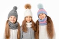 Group of cute kids in winter warm hats and scarfs on white. Children winter clothes