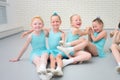 Group of cute little ballet dancers having fun at dance school class. Royalty Free Stock Photo