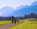 Group of cyclists biking in mountains