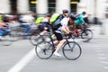 Group of cyclists in the city in motion blur Royalty Free Stock Photo