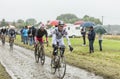 Group of Cyclists on a Cobblestone Road - Tour de France 2014 Royalty Free Stock Photo