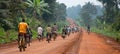 Group of cyclists enjoying a leisurely ride together on a picturesque country path