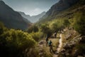 group of cyclists and mountain bikers riding on scenic trail through the mountains Royalty Free Stock Photo