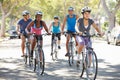 Group Of Cyclists On Suburban Street